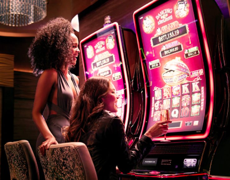 Tampilan permainan slot online berwarna-warni di layar komputer dan ponsel